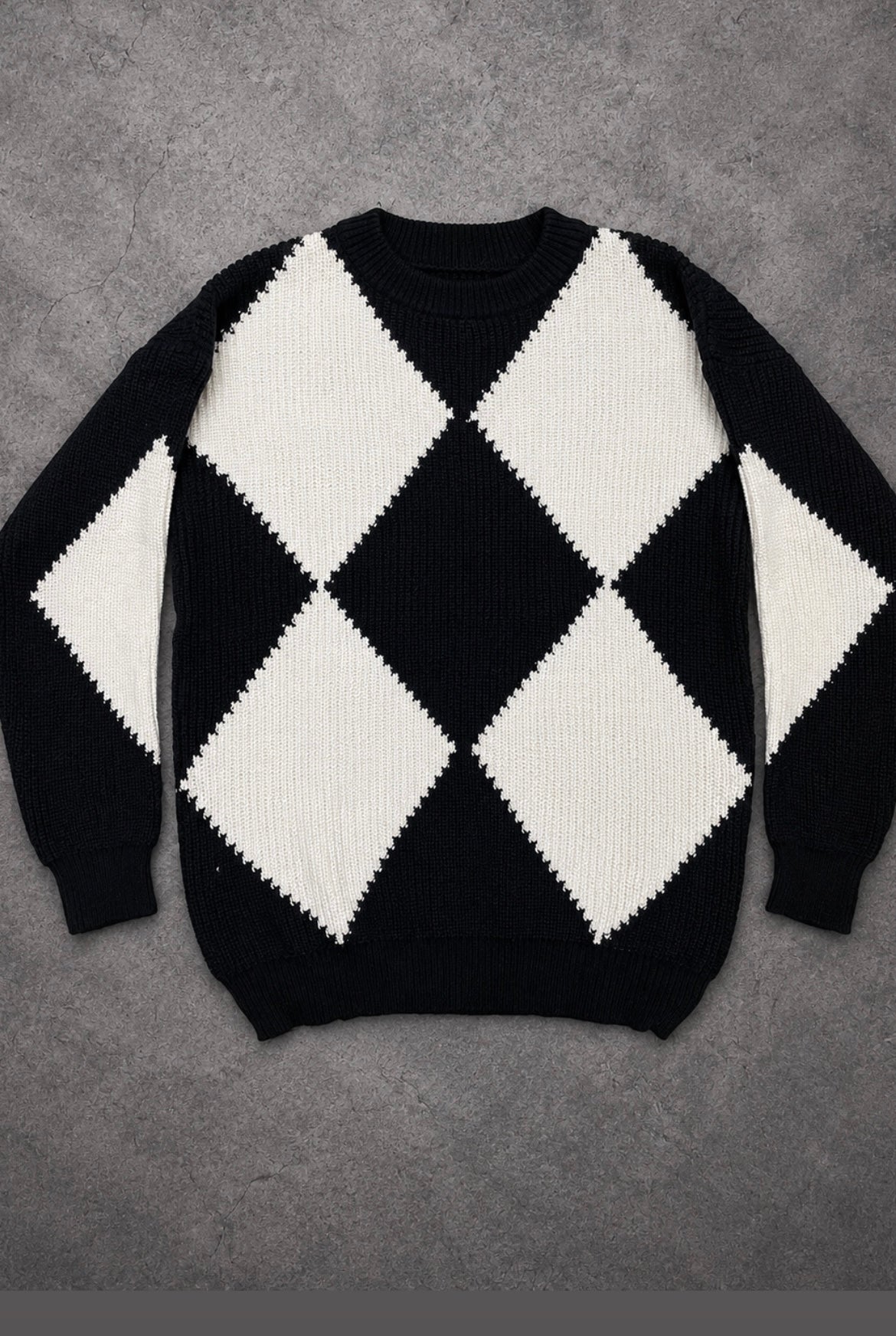 Grid and grain knit sweater